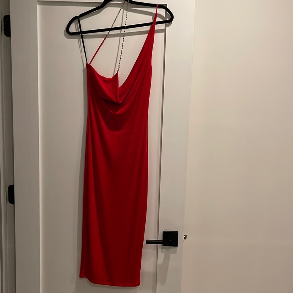 Red MIDI dress with rhinestone detail that goes across chest.